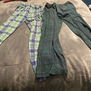 A bundle of plaid pajama pants